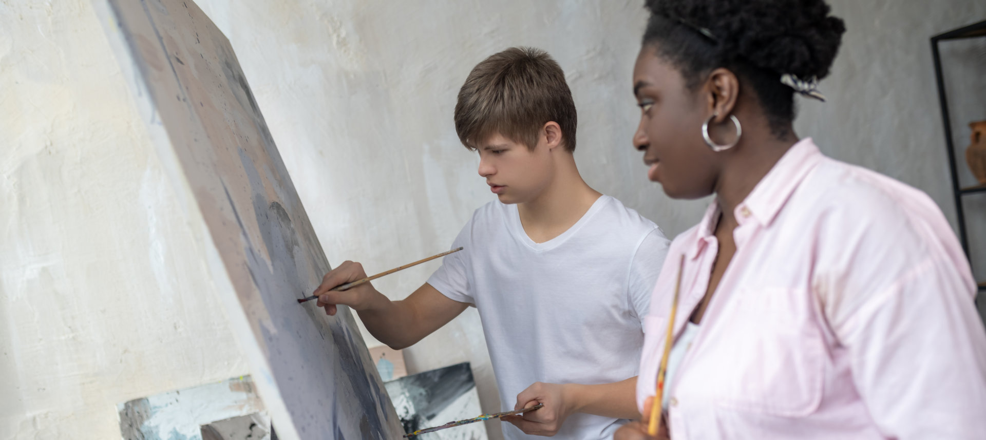 Woman teaching how to paint