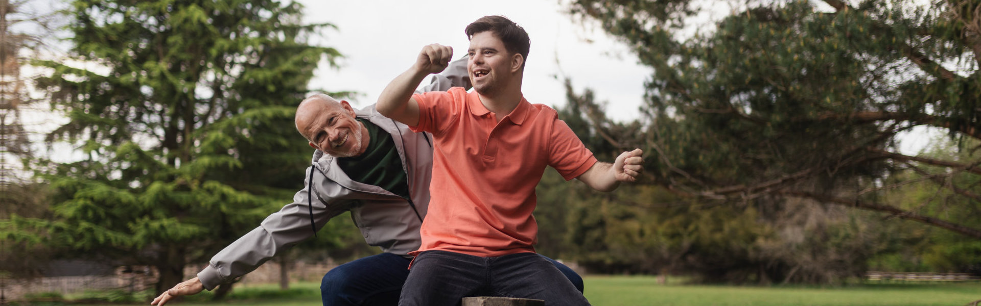 Father and his son posing in front of the camera